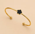 Noir Clover Armreif – Gold