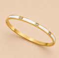 Lumière Blanc Armreif – Gold